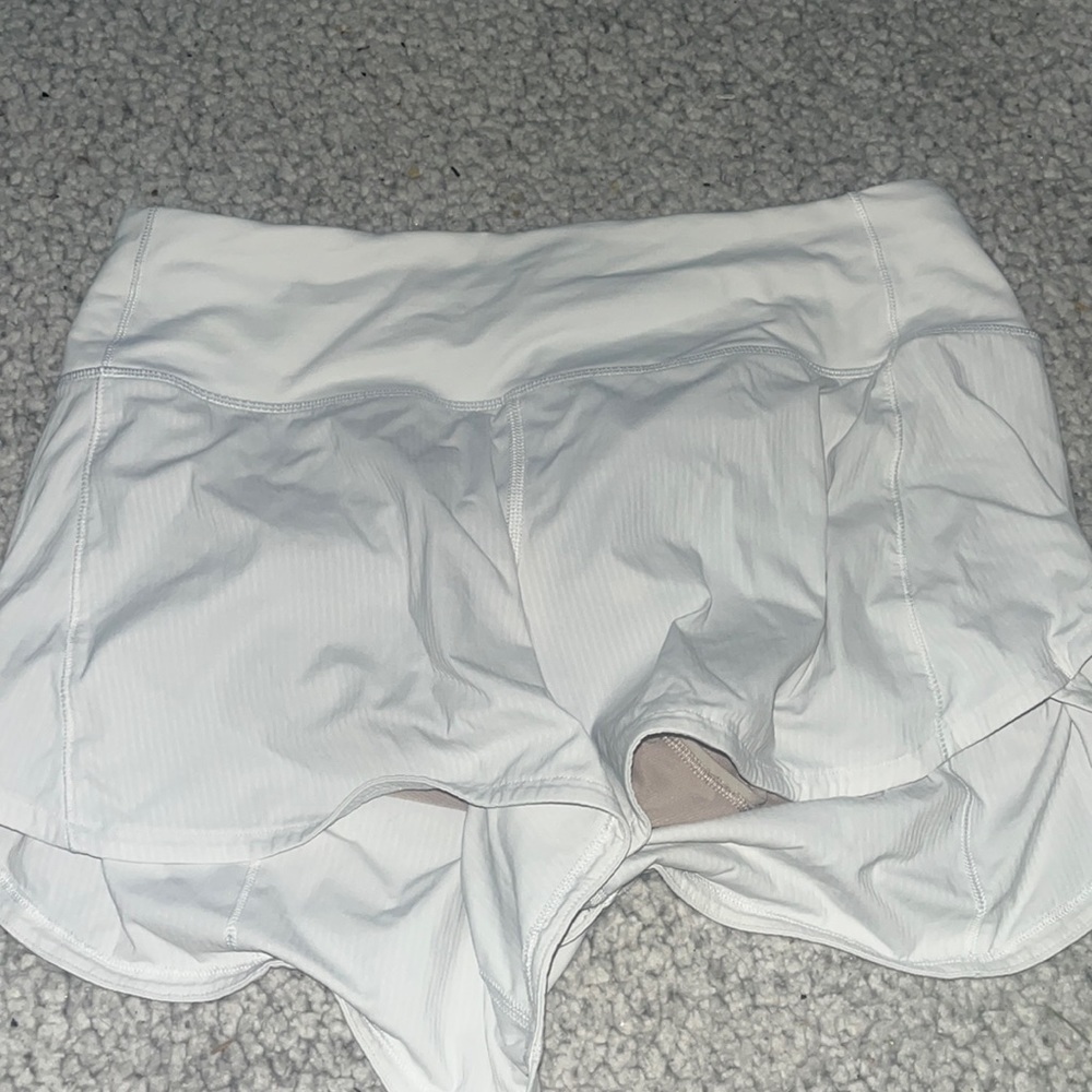 white lululemon shorts